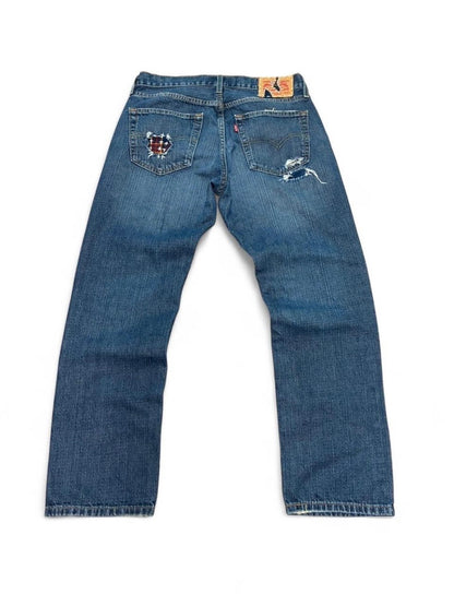 Sashiko boro repaired jeans w/ flannel patchwork