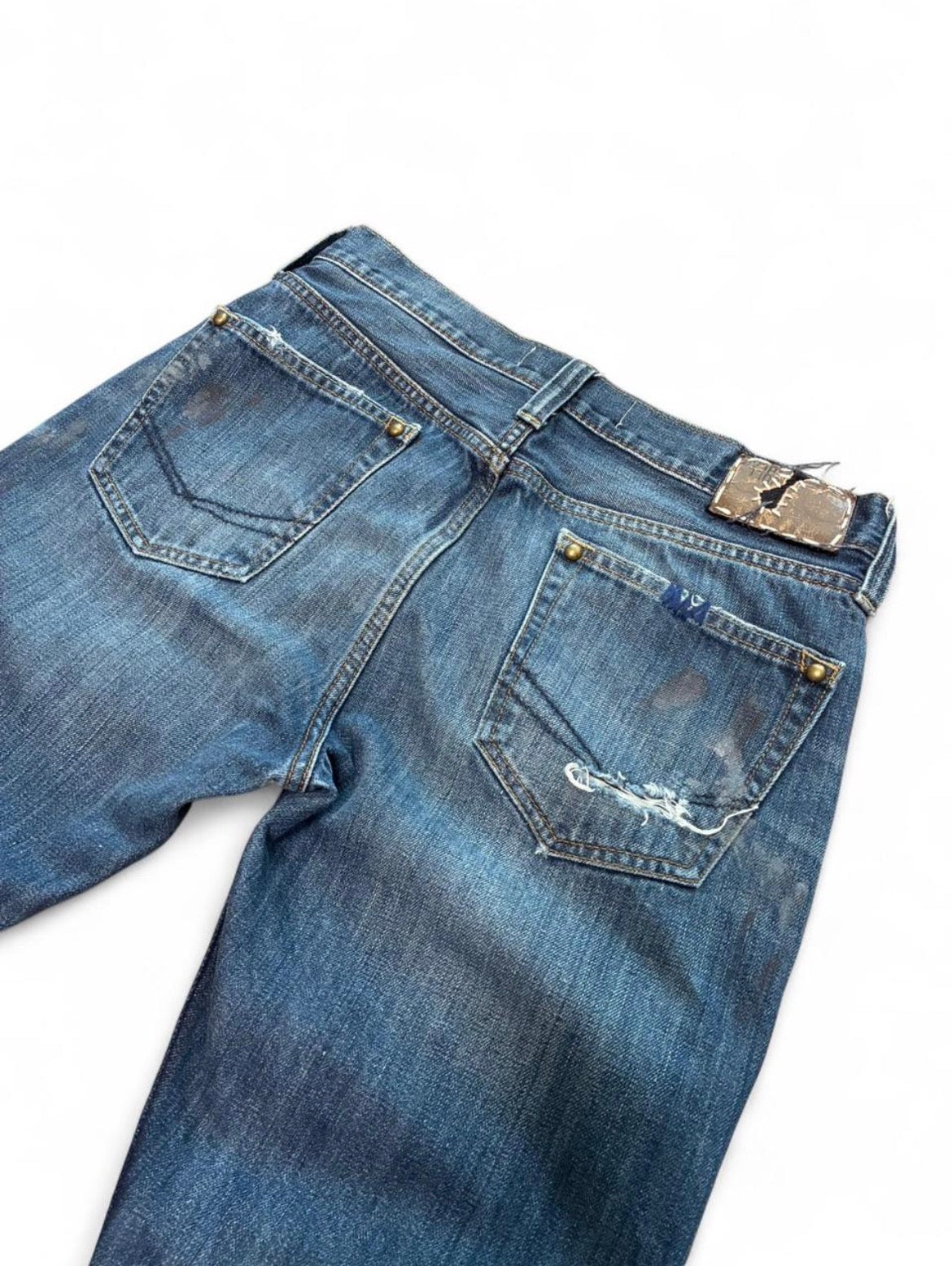 Sashiko repaired patchwork jeans w/ rust splatter