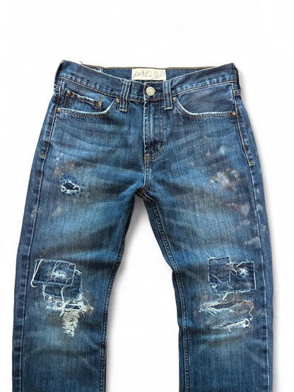 Sashiko repaired patchwork jeans w/ rust splatter