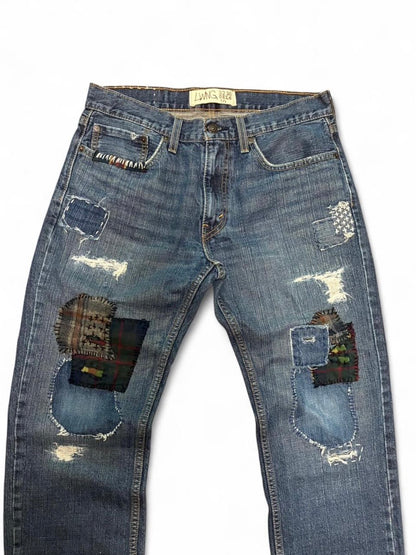 Sashiko boro repaired jeans w/ flannel patchwork