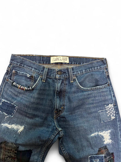 Sashiko boro repaired jeans w/ flannel patchwork
